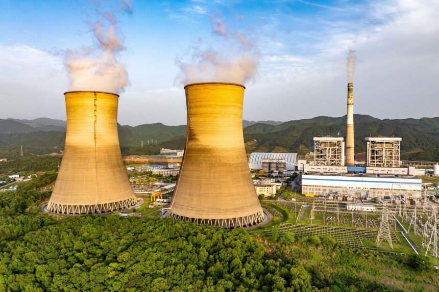 Thermal power plant, cooling tower of Dukovany Nuclear Power Plant at dusk
