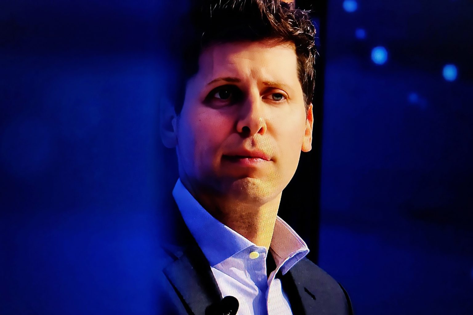 The image features Sam Altman, a prominent figure in the technology industry, known for his work in artificial intelligence