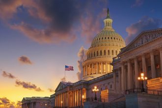 Congress Building seen from the side at sunset.