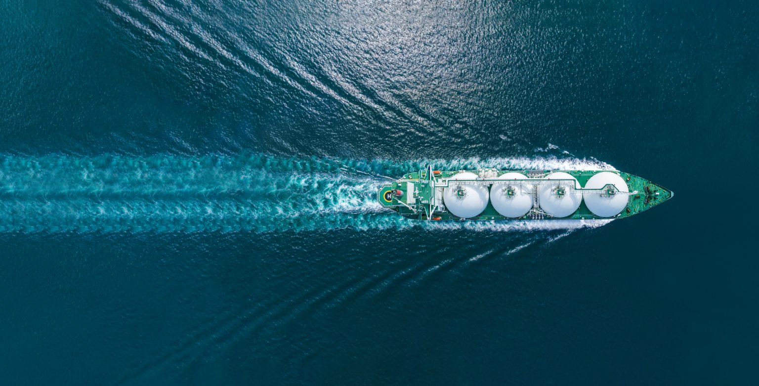 LNG (liquefied natural gas) tanker with aerial view and controller on a ocean-going vessel.