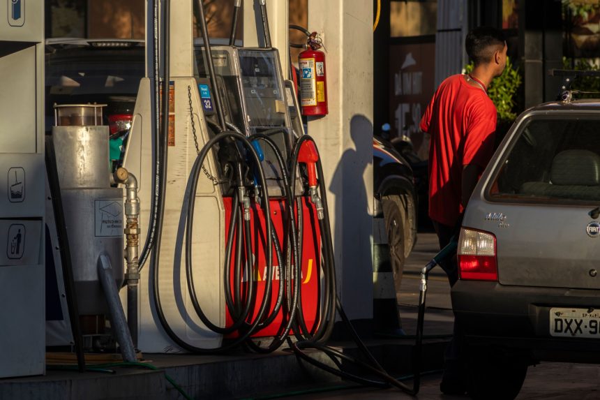 Marilia, SP, Brazil, June 20, 2025. Gas pump at a fuel station with hoses and nozzles. Reflects fuel consumption, urban infrastructure, and dependence on non-renewable energy.