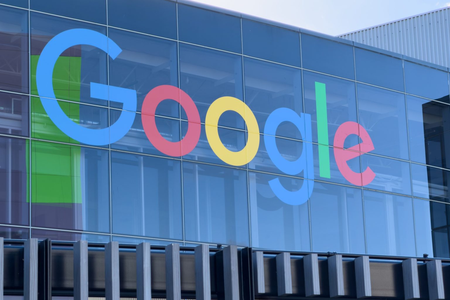 Mountain View, CA - December 27, 2025: Google Logo On Glass Building Exterior.